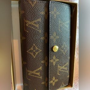 NEW to you-unused Louis Vuitton long trifold monogram wallet